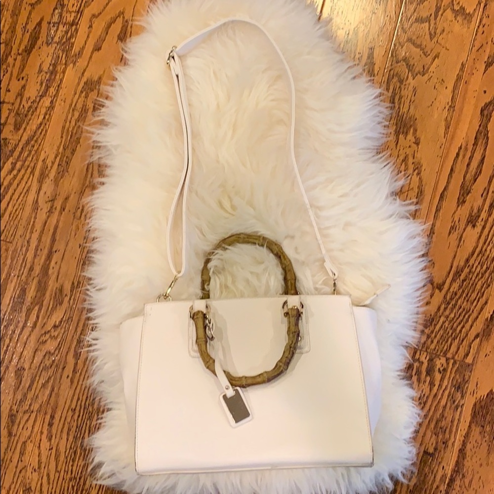 White shoulder bag with faux bamboo handle